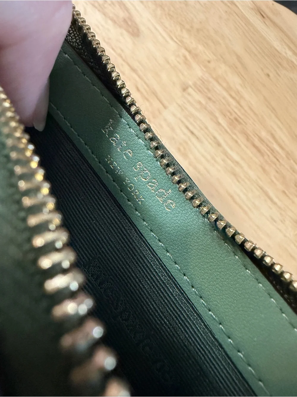 Kate Spade New York green leather wallet with pebbled texture in great condition